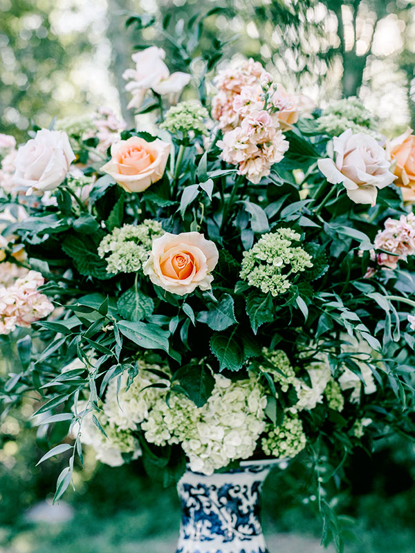 Gorgeous floral centerpiece at a wedding reception. Autumn Cutaia photography.